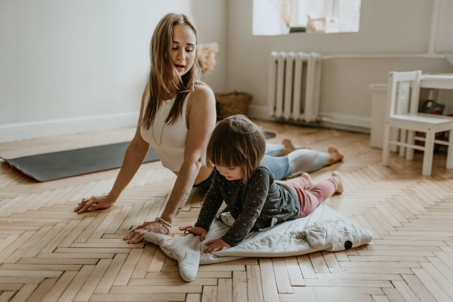 Mum and kid exercising